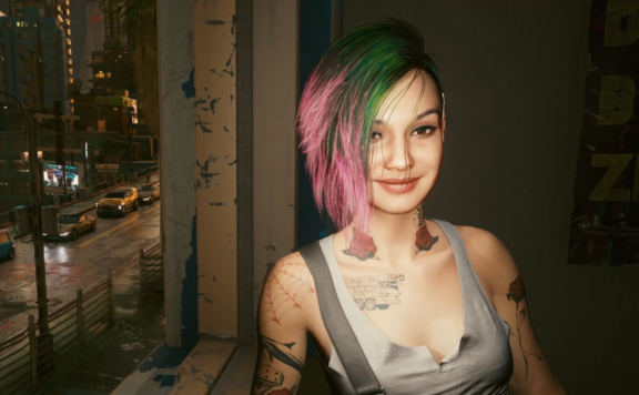 Judy Alvarez Cyberpunk 2077 Screenshot smiling in apartment